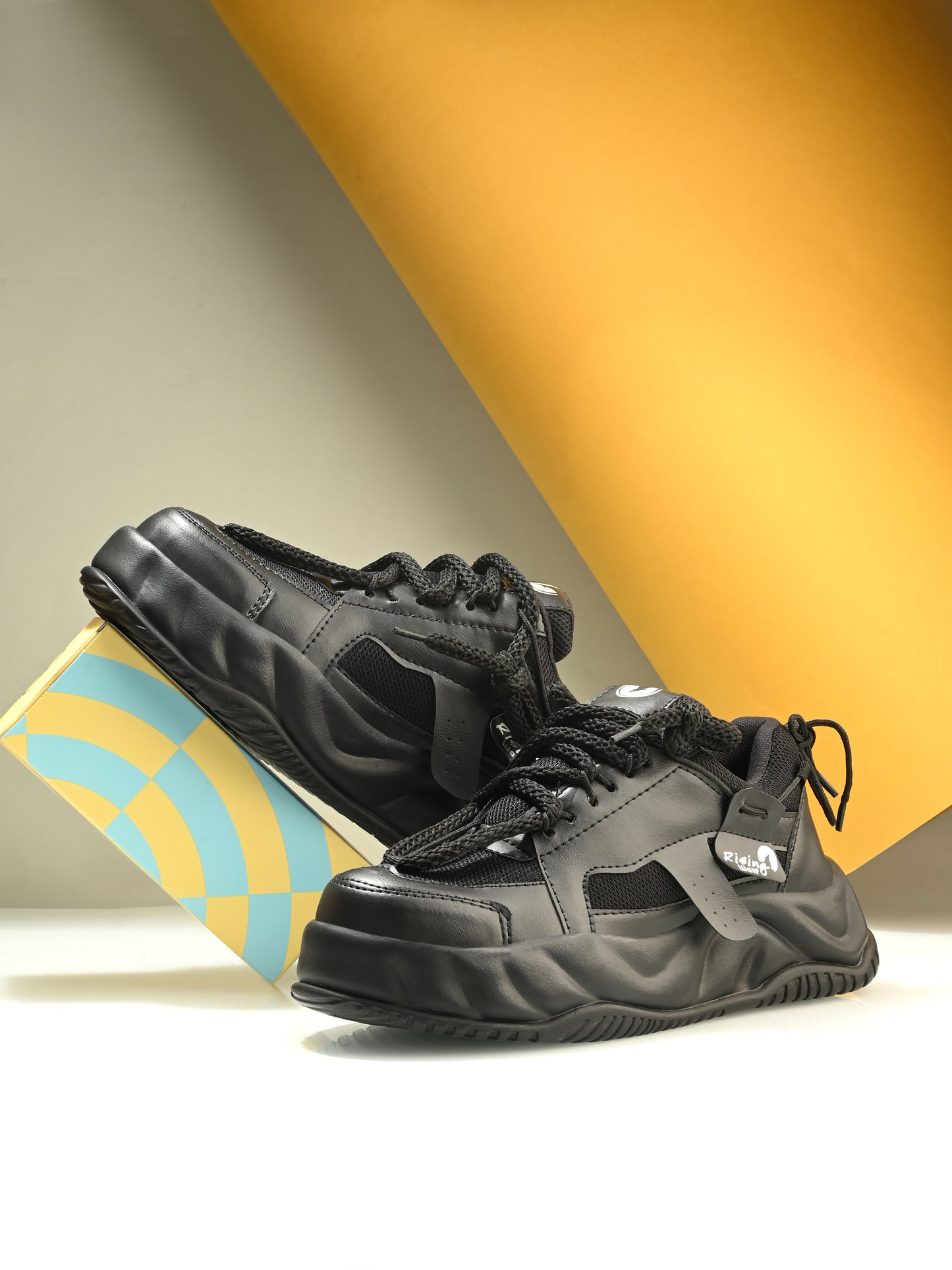 Mens sports shoes in black designed as comfortable black running shoes with stylish accents