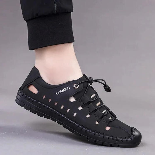 Black mens casual slip on shoes with breathable cutouts and adjustable elastic lace for comfort