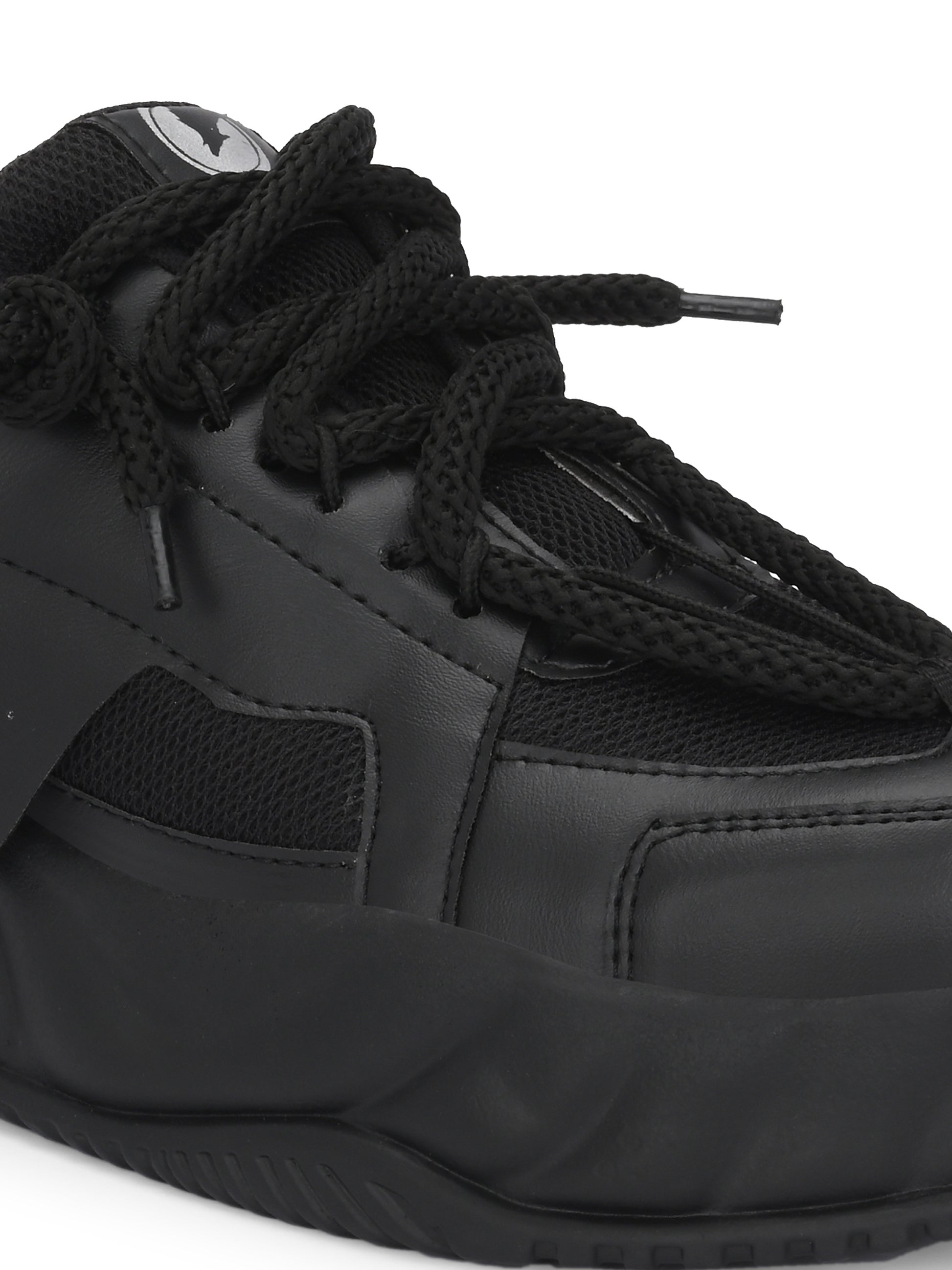Close-up of comfortable black running shoes with breathable mesh and sturdy sole for men