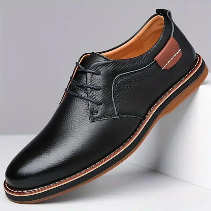 Black comfortable men's lace up dress shoes with brown accents and cushioned sole
