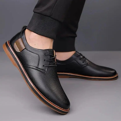 Comfortable men's lace up dress shoes in black leather with brown sole and casual design