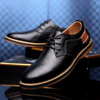 Black comfortable men's lace up dress shoes with brown accents and durable sole for casual wear