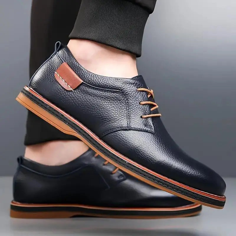 Comfortable men's lace up dress shoes in black leather with brown accents and rubber sole