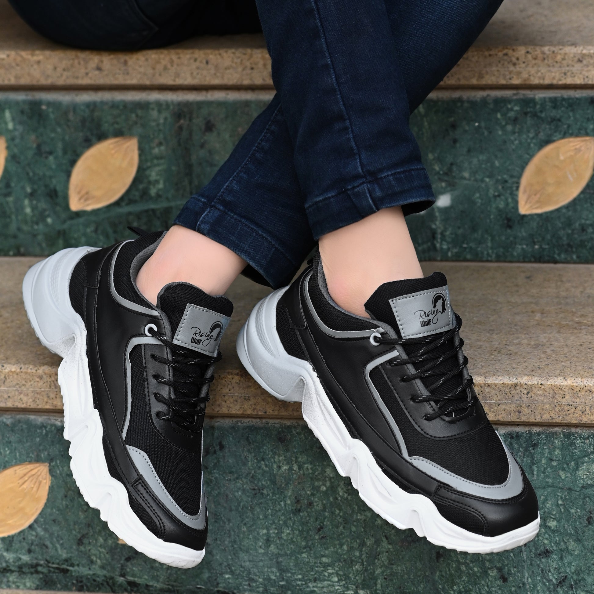 Mens lightweight sport shoes for daily wear in black and gray with thick white soles