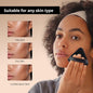 Woman using black makeup puff for loose powder on face suitable for oily, dry, and combination skin