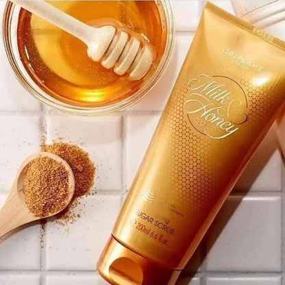 Oriflame Milk and Honey Gold sugar scrub tube alongside honey and brown sugar for the best body scrub for glowing skin