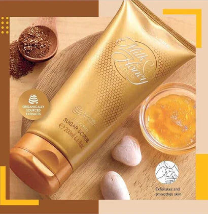 Gold tube of sugar scrub cream with organic extracts for exfoliating and smoothing skin best body scrub for glowing skin