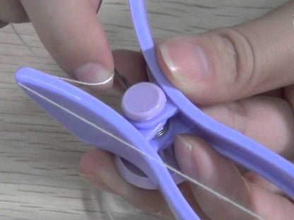 Hands using purple precision eyebrow tweezers and epilator for detailed eyebrow grooming