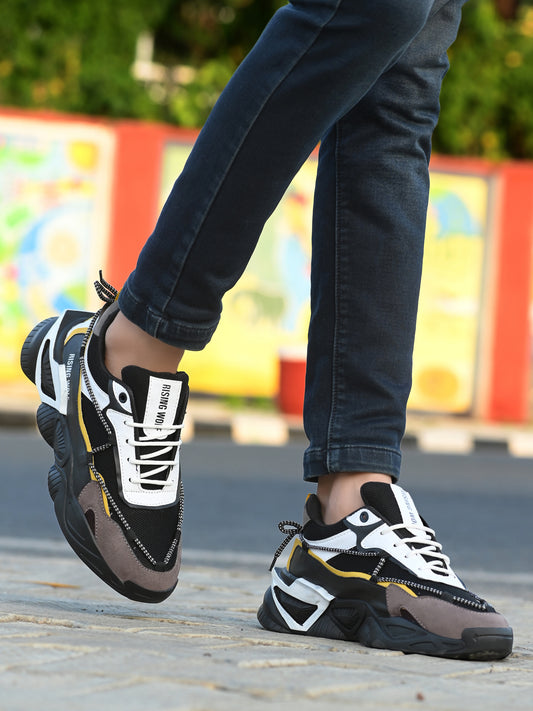 Mens leather running shoes for everyday wear in black white and gray with yellow accents