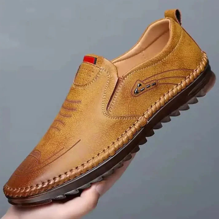 Soft leather casual shoes for men in tan with stitched detailing and slip-on design