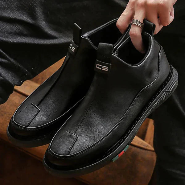 Black men's casual shoes with slip-on design and textured sole for everyday comfort